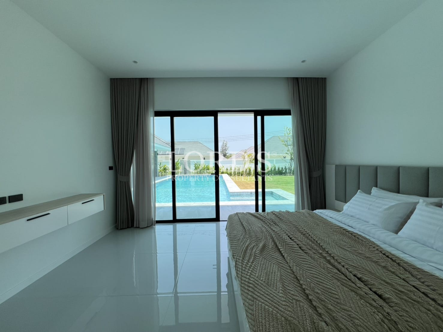 Bedroom with large glass doors
