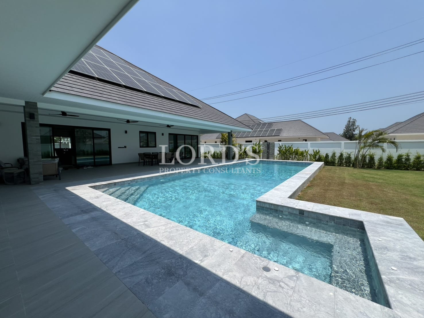 Pool with shaded sitting area