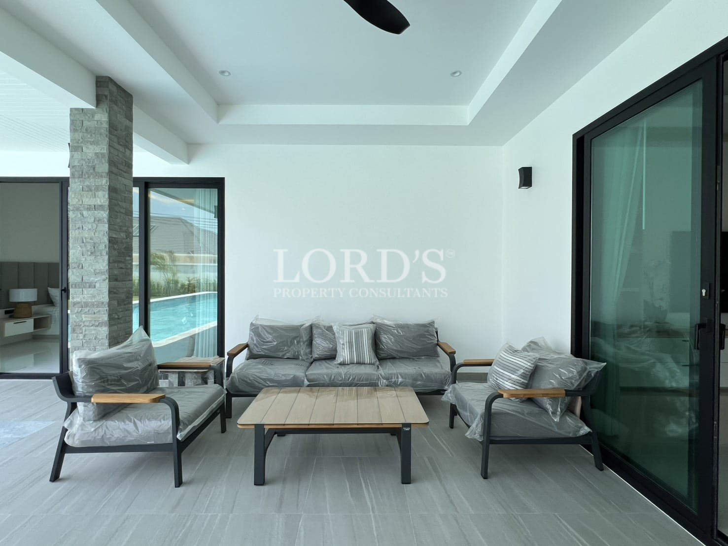 Outdoor seating area near pool