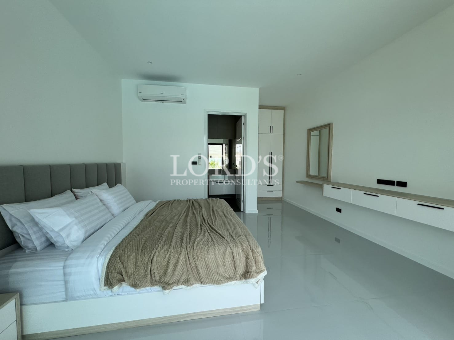 Bedroom with minimalist decor and soft tones