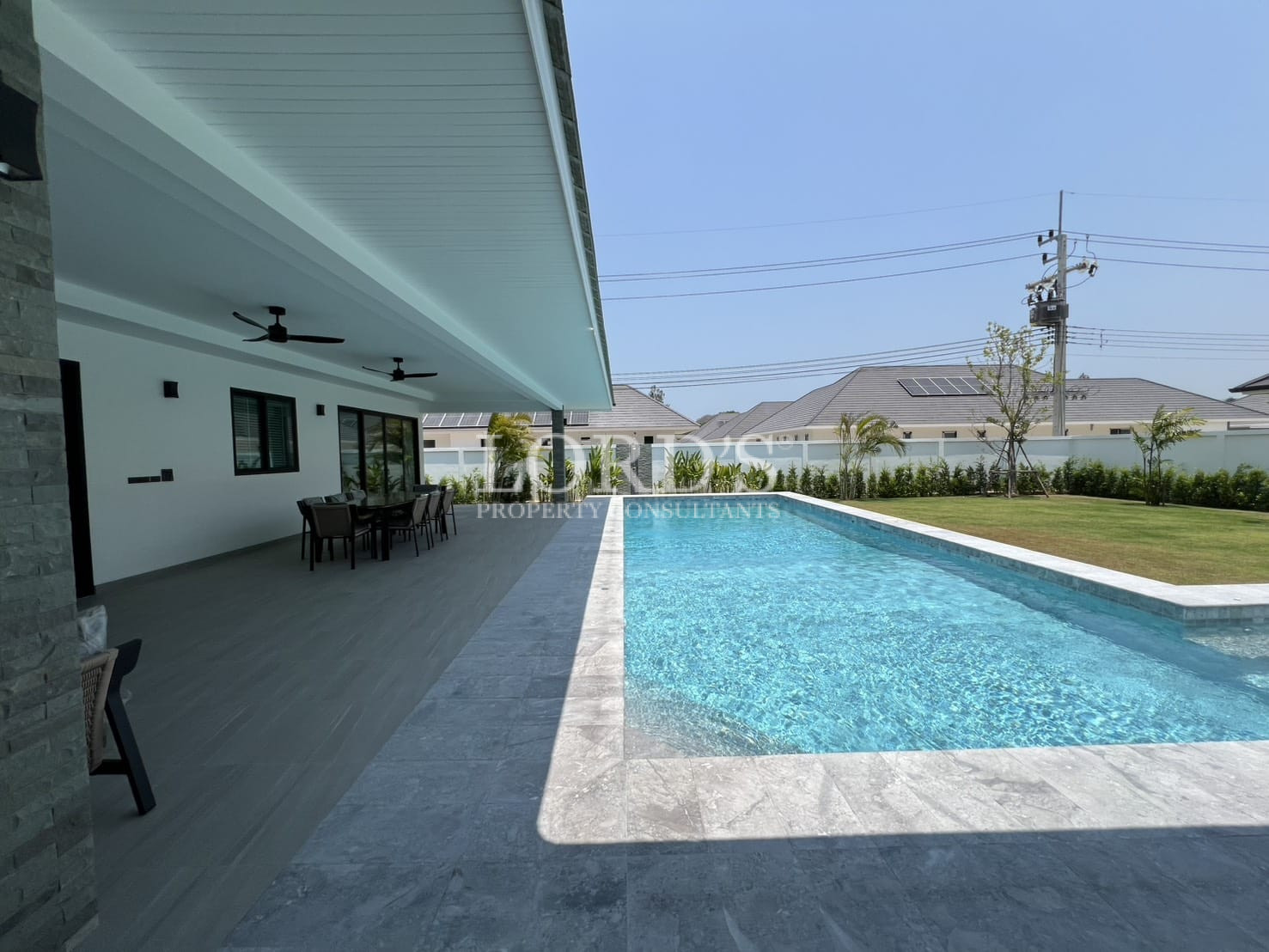 Swimming pool beside modern house
