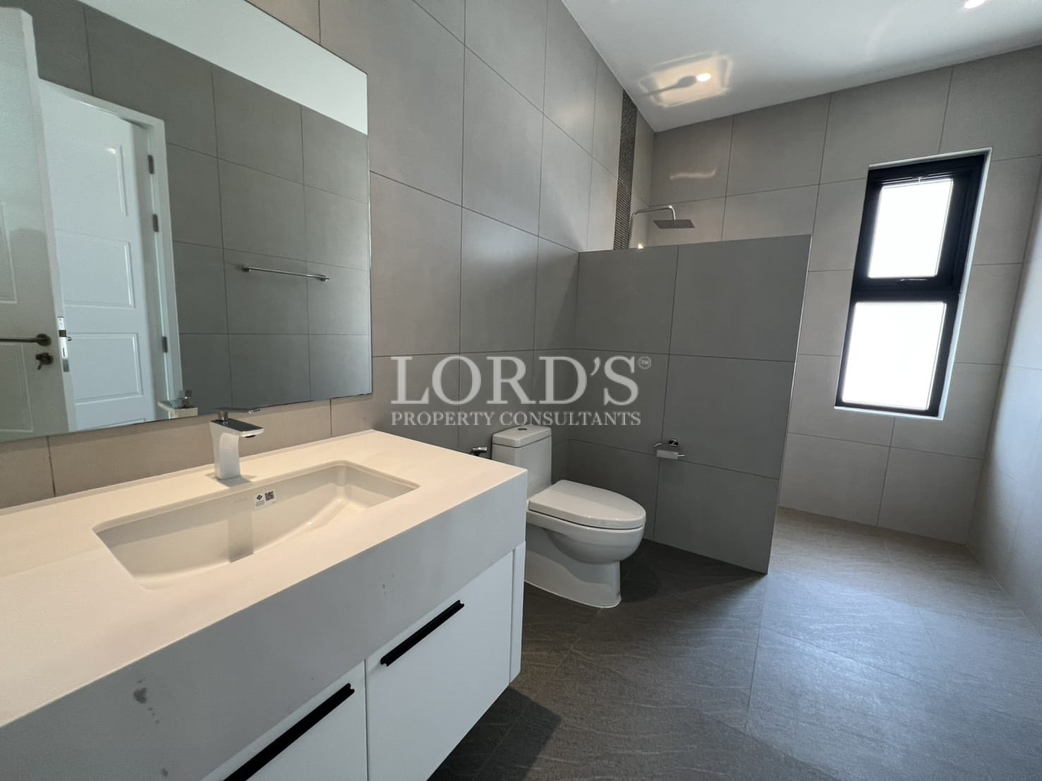 Contemporary bathroom with sink and toilet