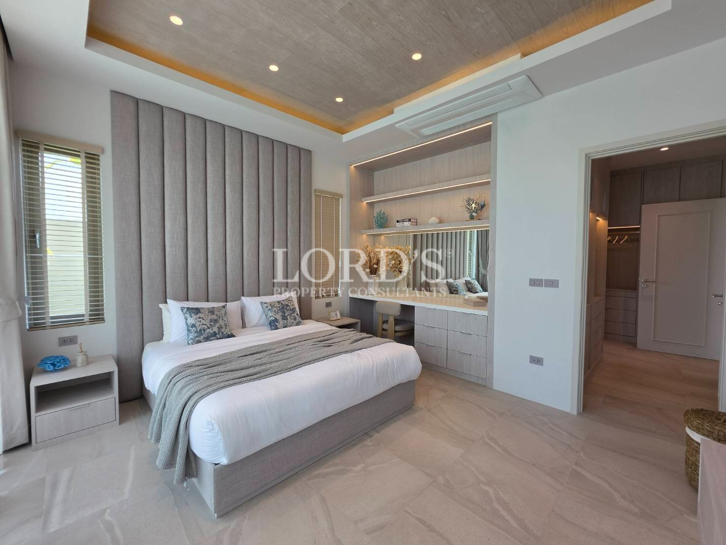 Spacious bedroom with modern ceiling design