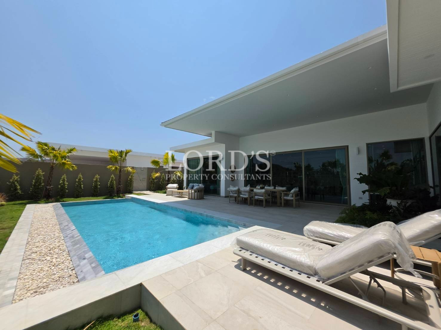 Poolside lounge with sunbeds