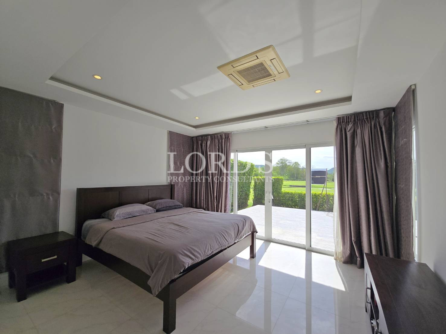 Bedroom with bed and sliding doors
