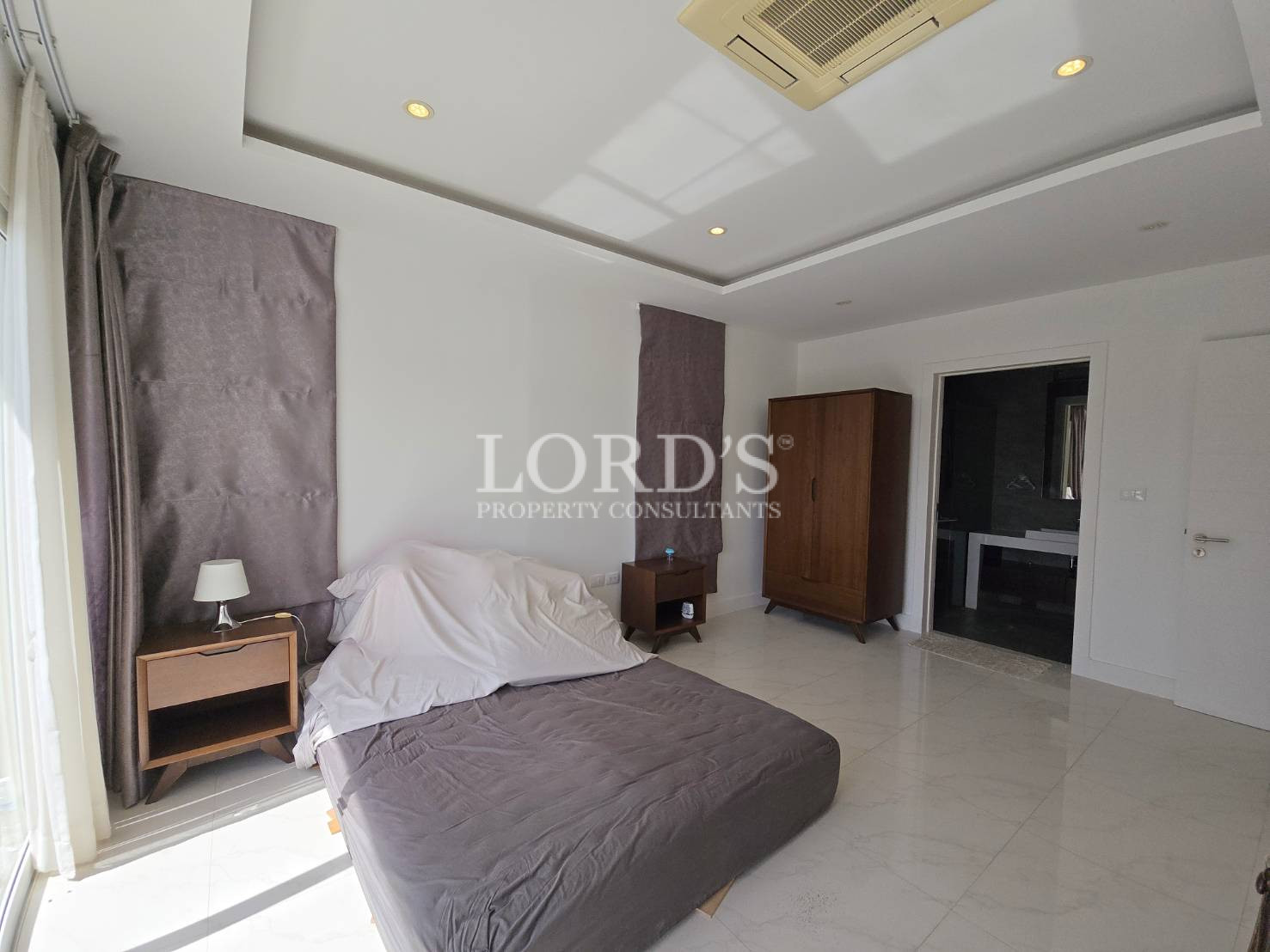Bedroom with bed and wardrobe