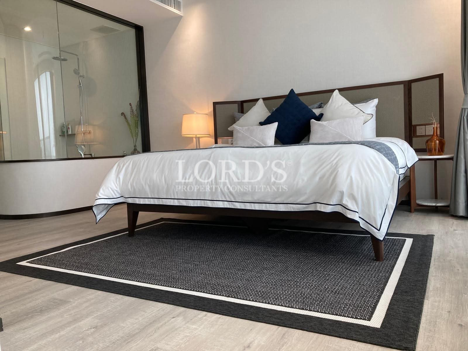 Bedroom with bed and neutral decor