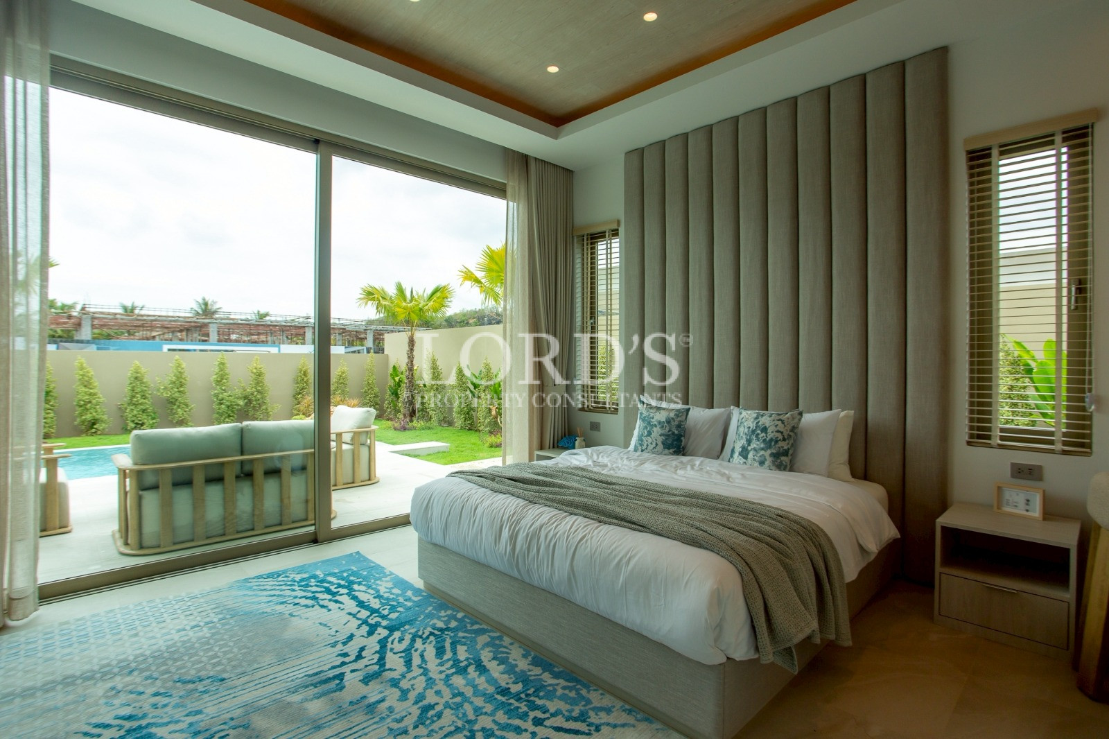 Bedroom with balcony and greenery view