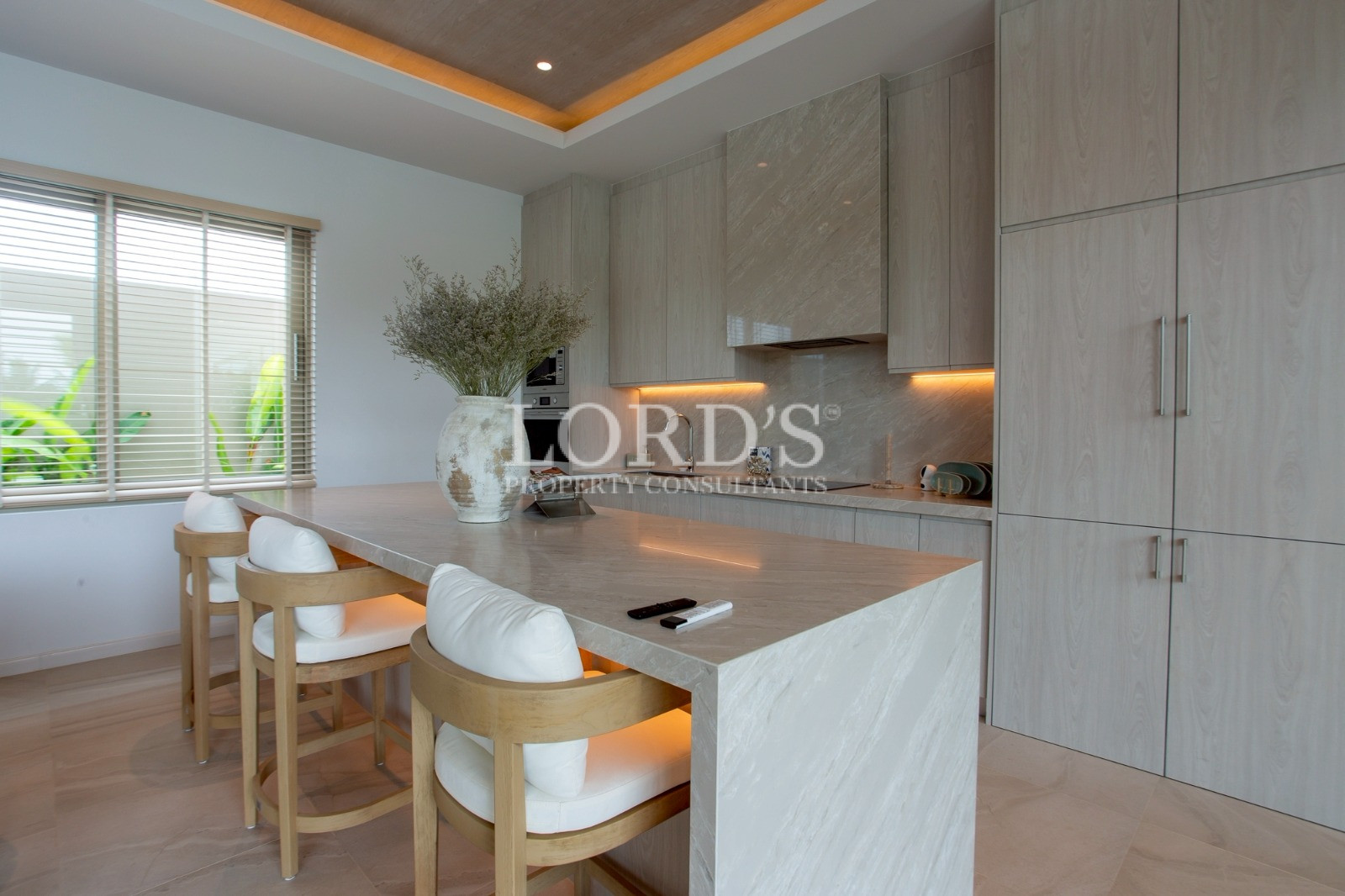 Dining area beside modern kitchen