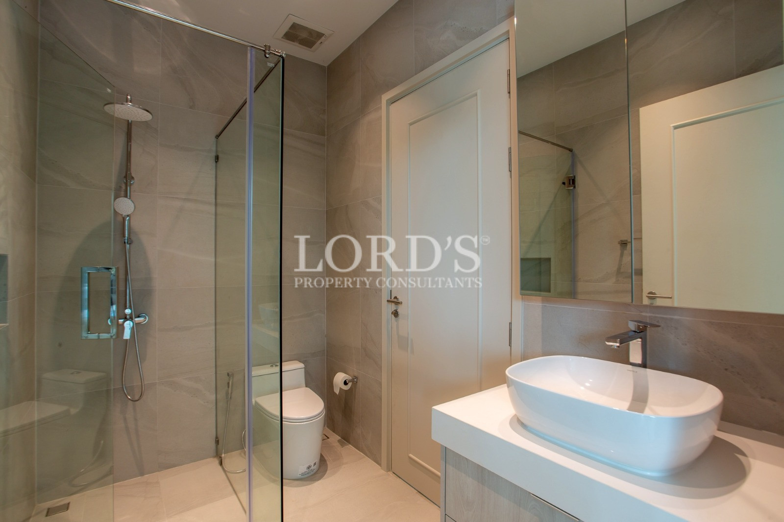 Bathroom with bathtub and glass shower