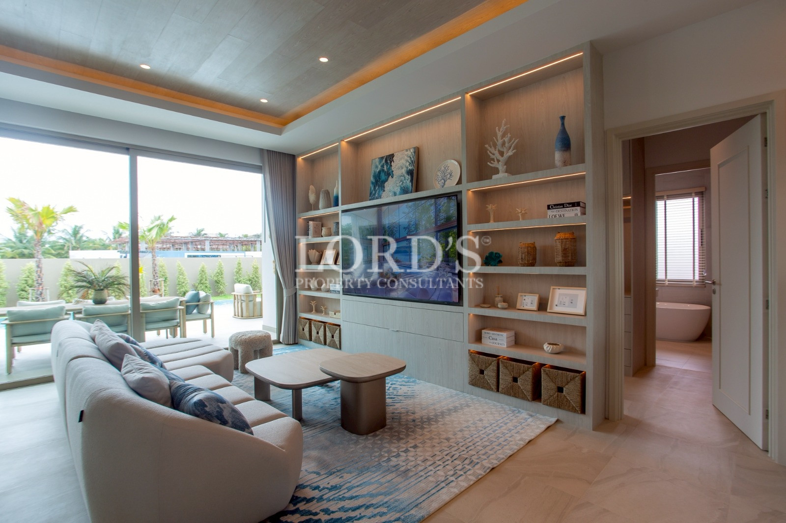 Open living and dining area with shelving
