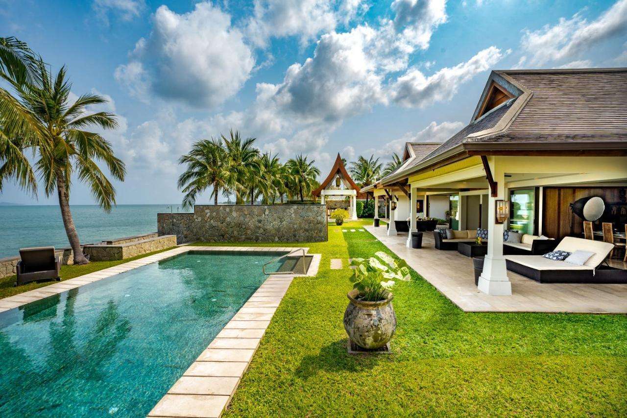 Beachfront luxury villa with private pool and tropical garden by the sea
