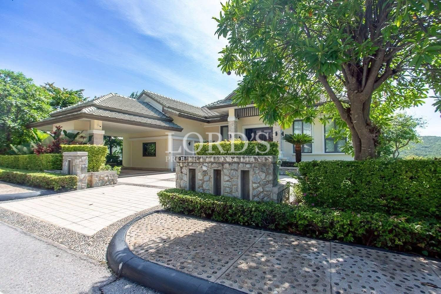 Modern villa exterior with landscaped garden
