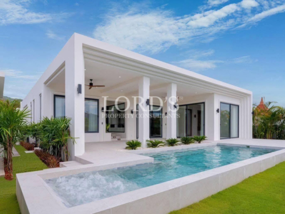 White villa with swimming pool