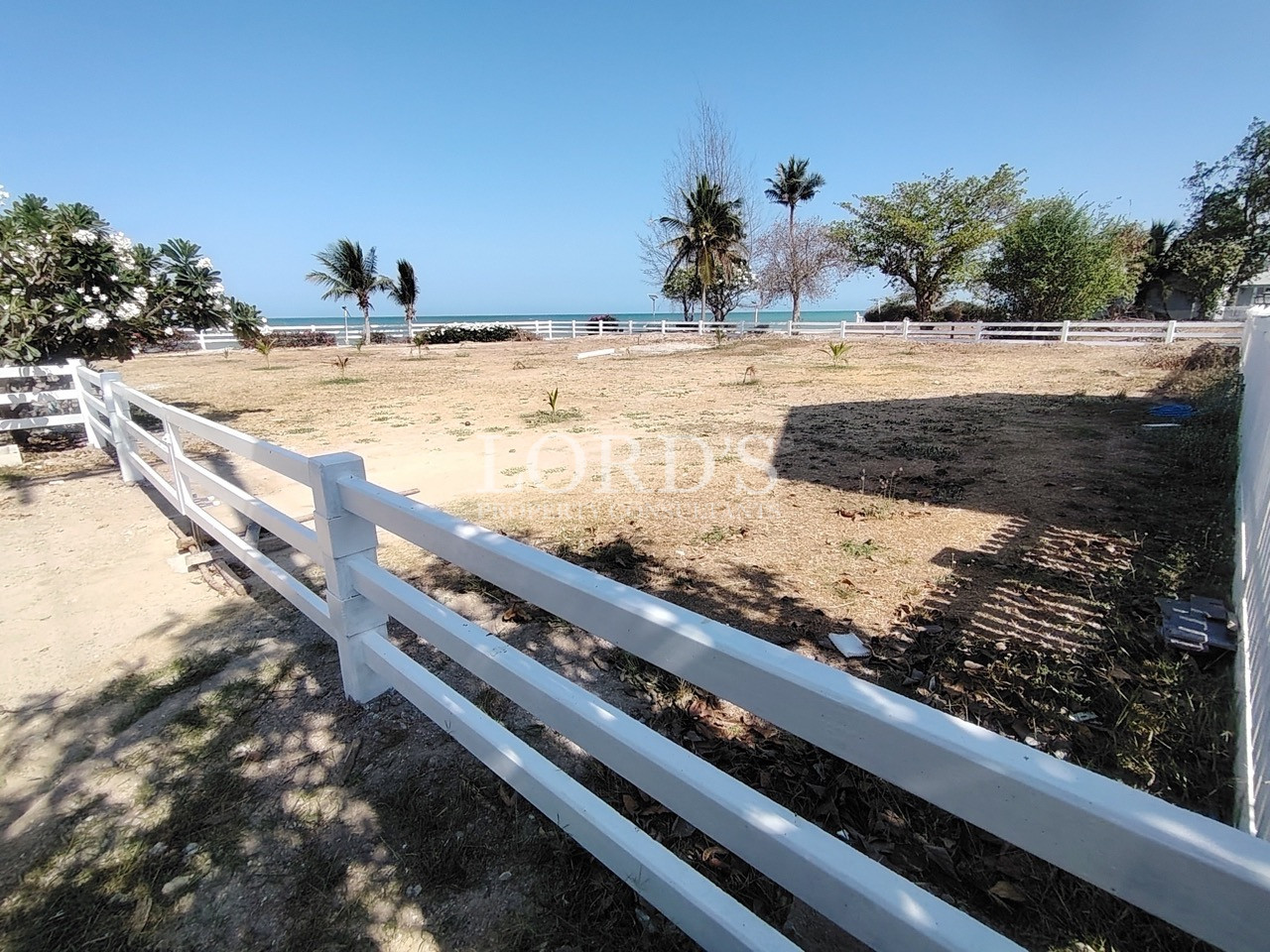 Beachfront fence with ocean view