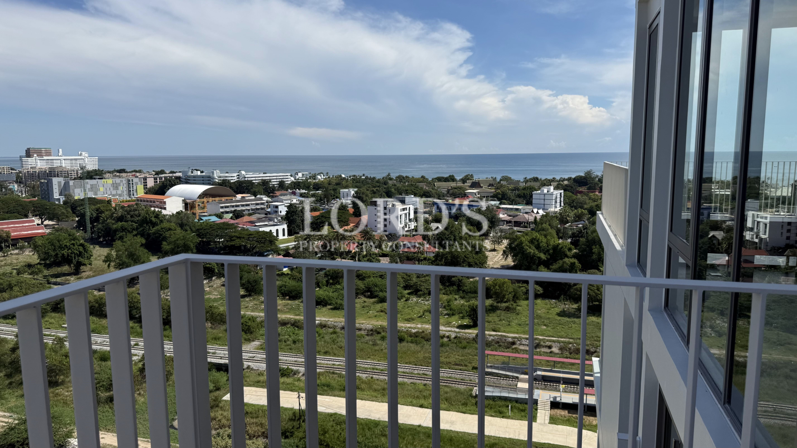 Balcony railing overlooking tropical landscape