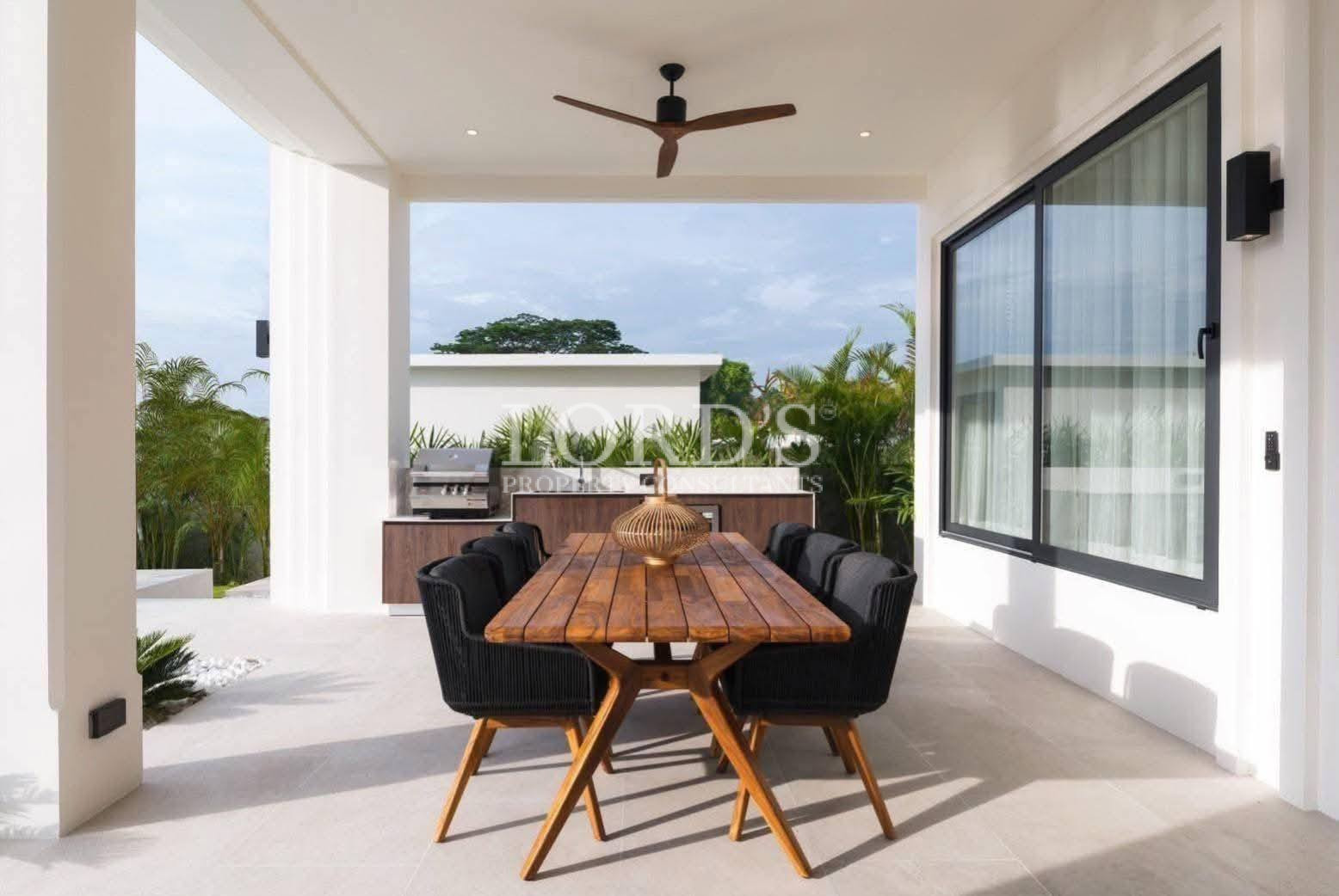 Dining area with outdoor pool view