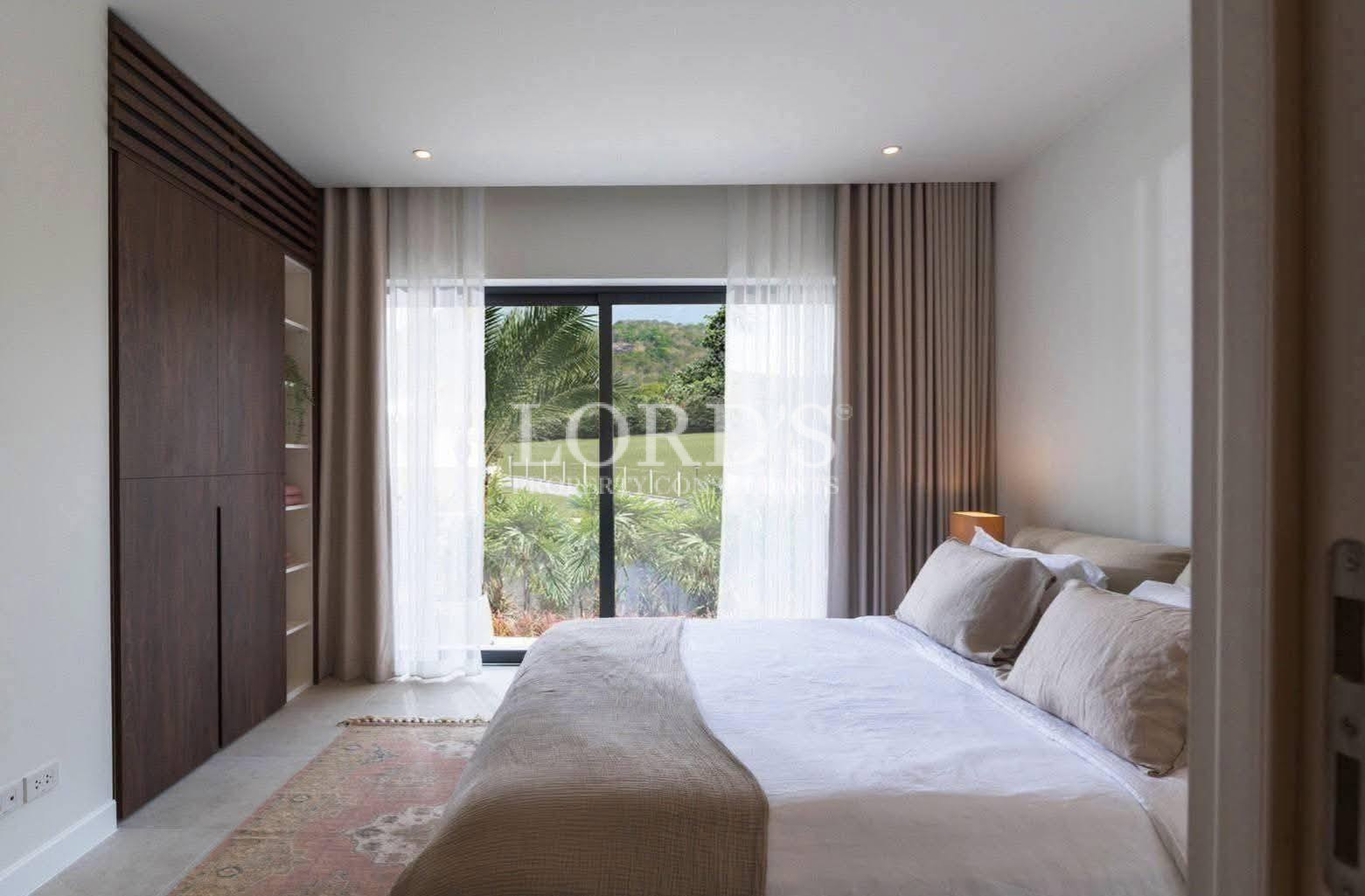 Bedroom with garden view window