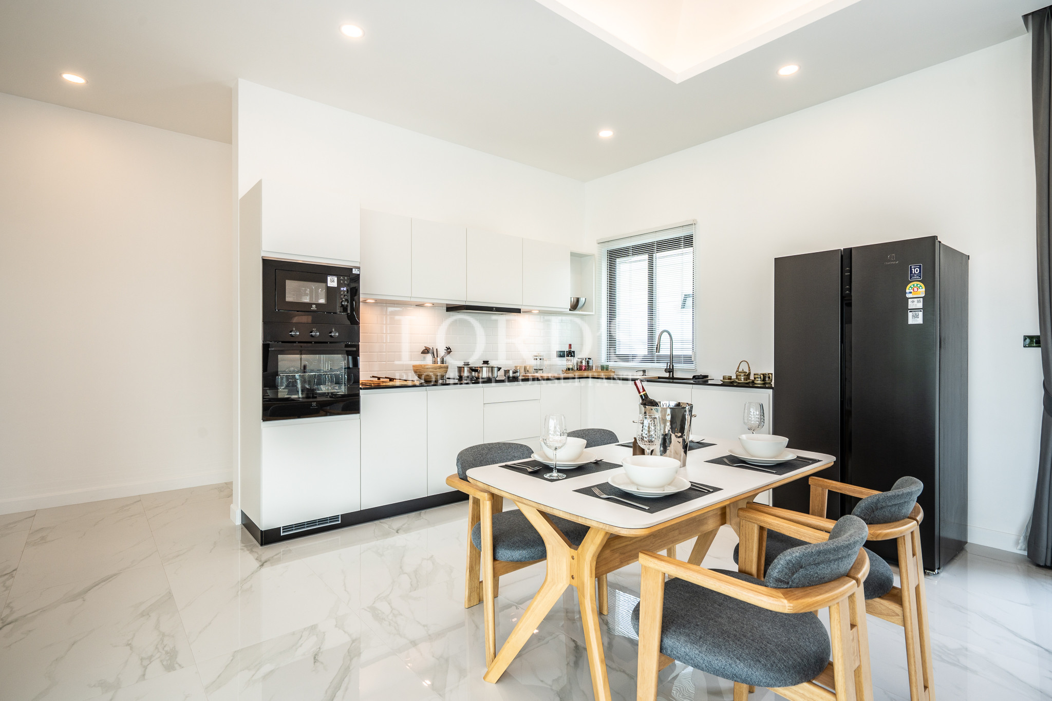 Minimalist dining room with kitchen island