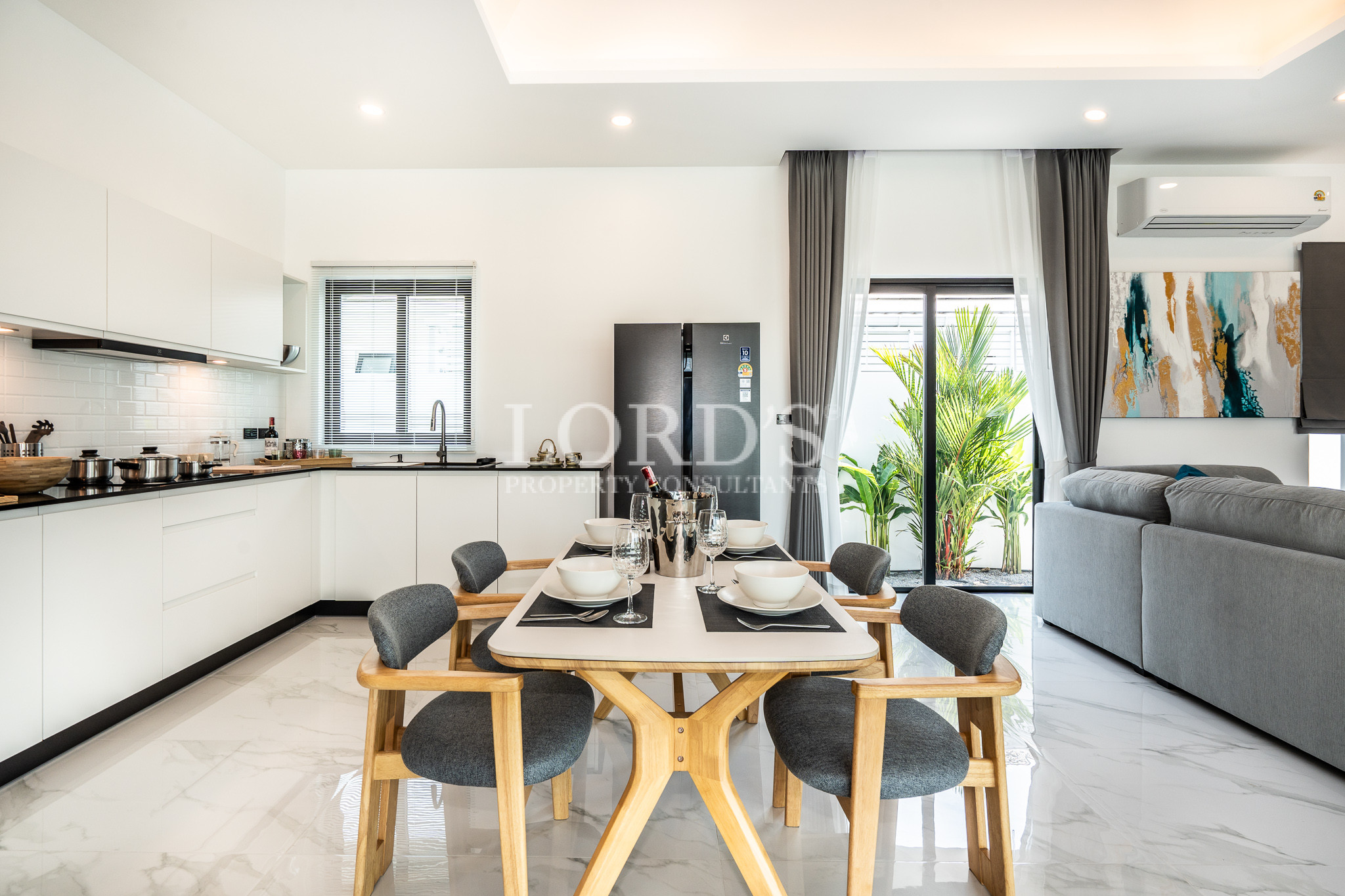 Bright dining area with modern kitchen