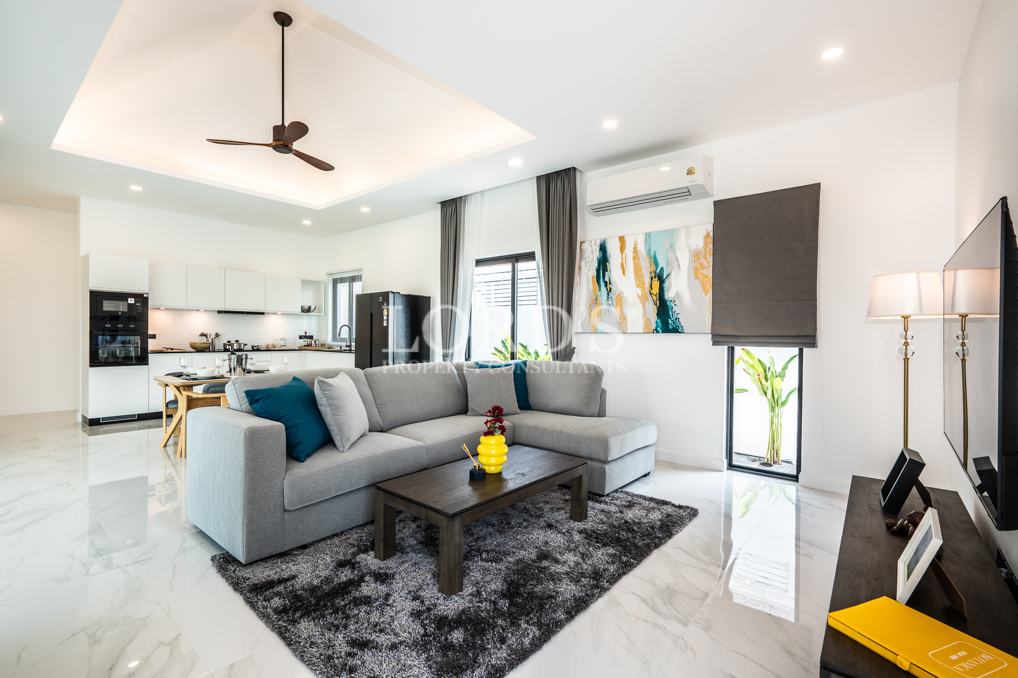 Spacious open-plan living room with sectional sofa