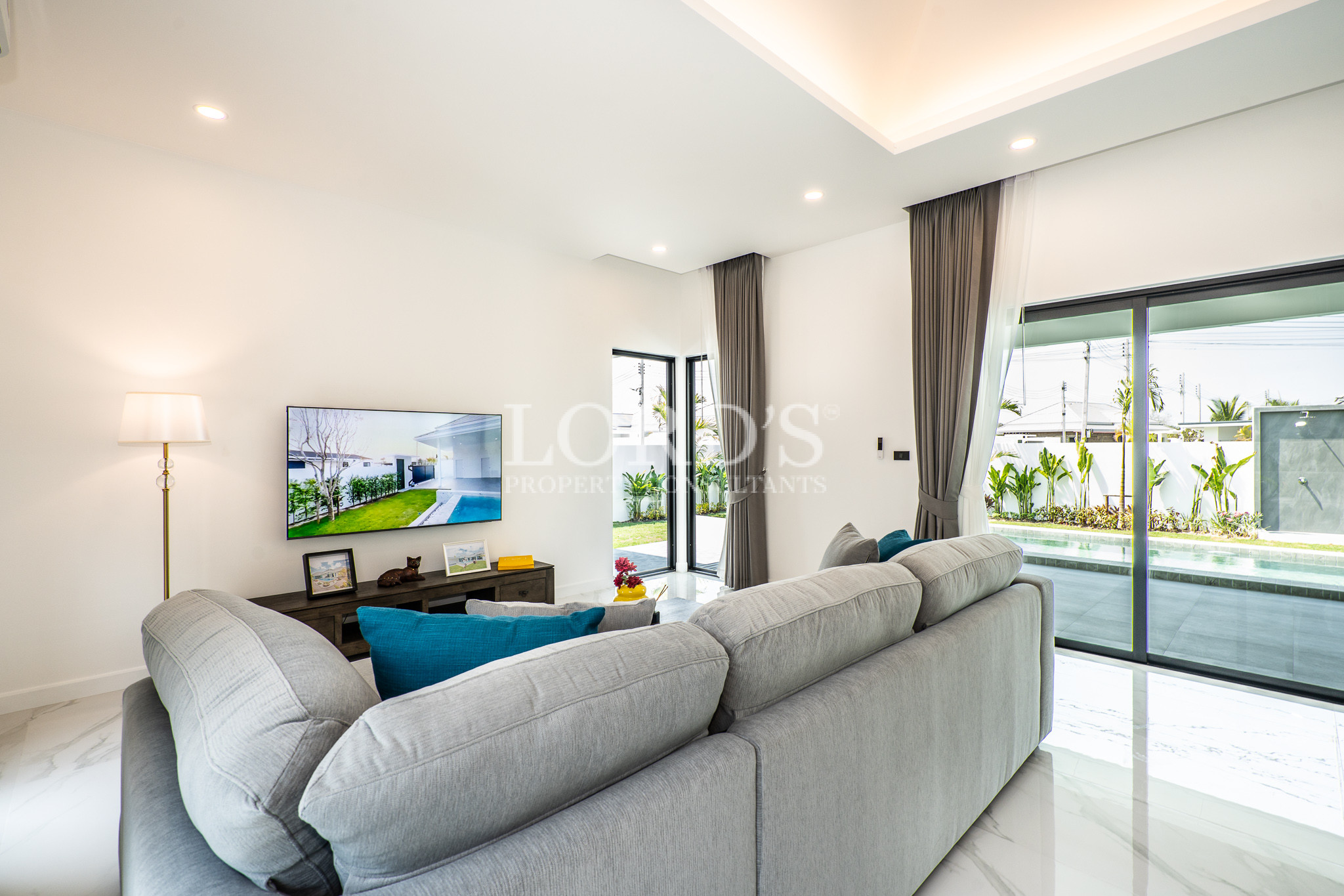 Modern living room with TV and sectional seating
