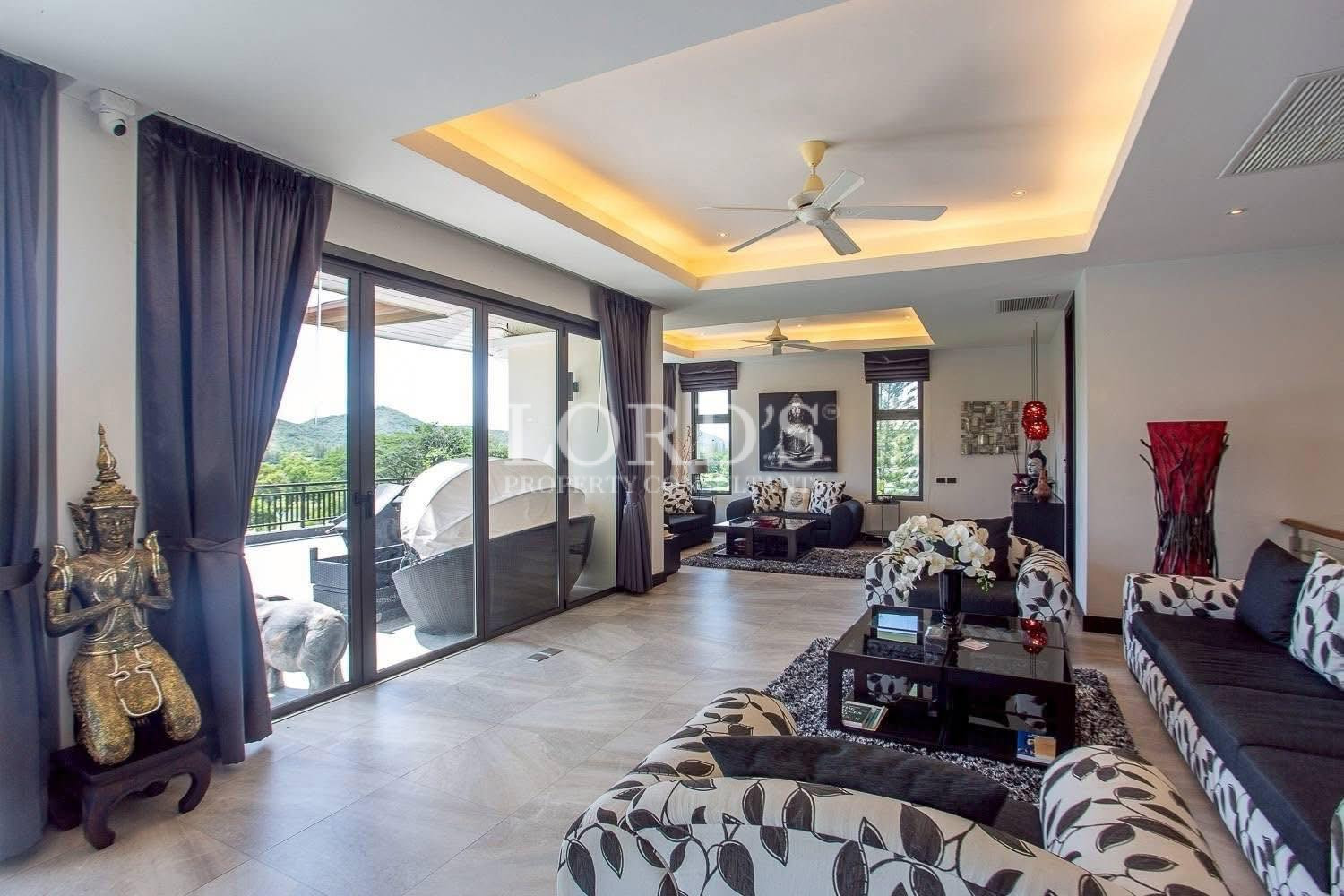 Spacious living room with panoramic glass walls