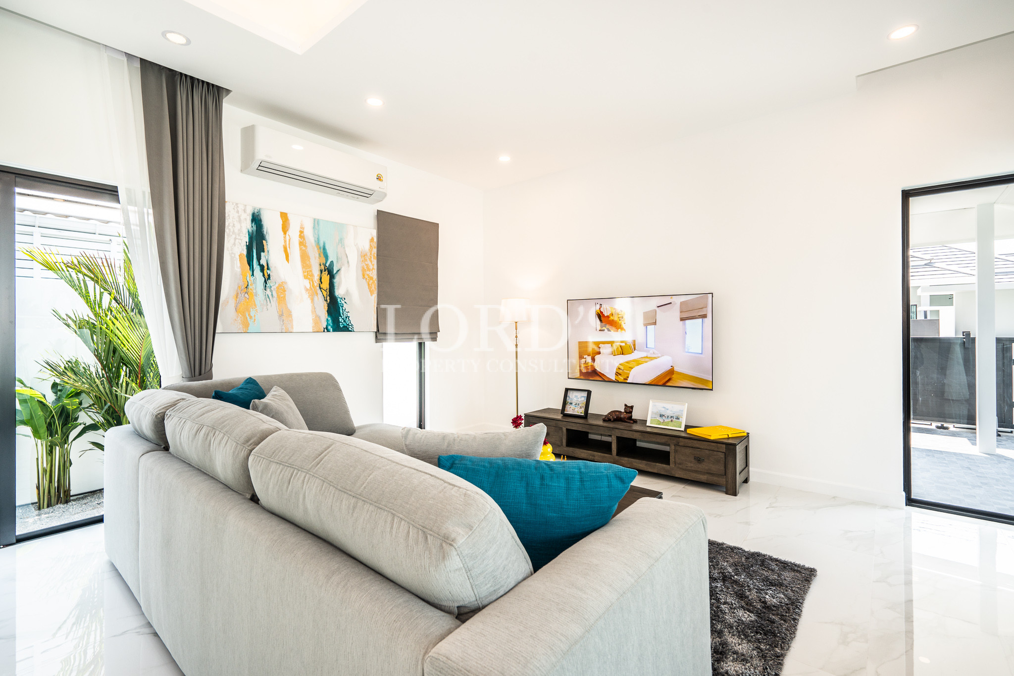 Bright living room with modern sofa and artwork