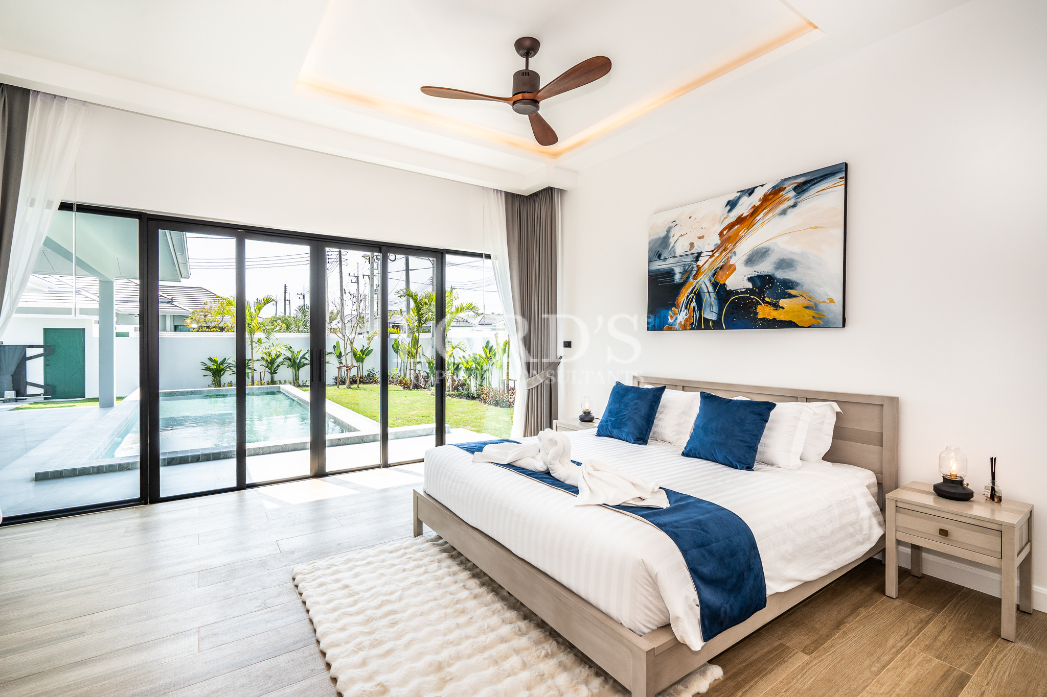 Luxury bedroom with floor-to-ceiling windows