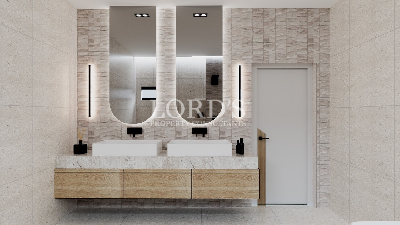 Modern bathroom vanity with illuminated mirrors