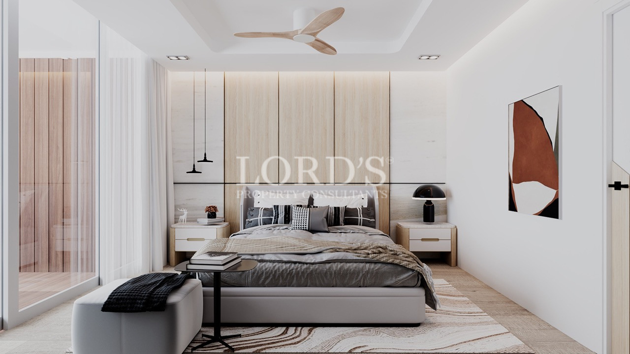 Contemporary bedroom with vanity and neutral décor