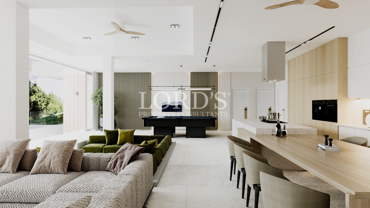 Modern living room with minimalist furniture and TV wall