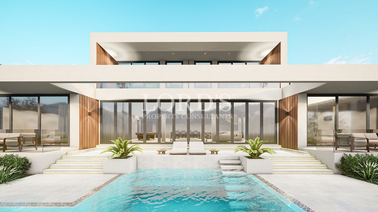 Modern two-storey villa with glass façade