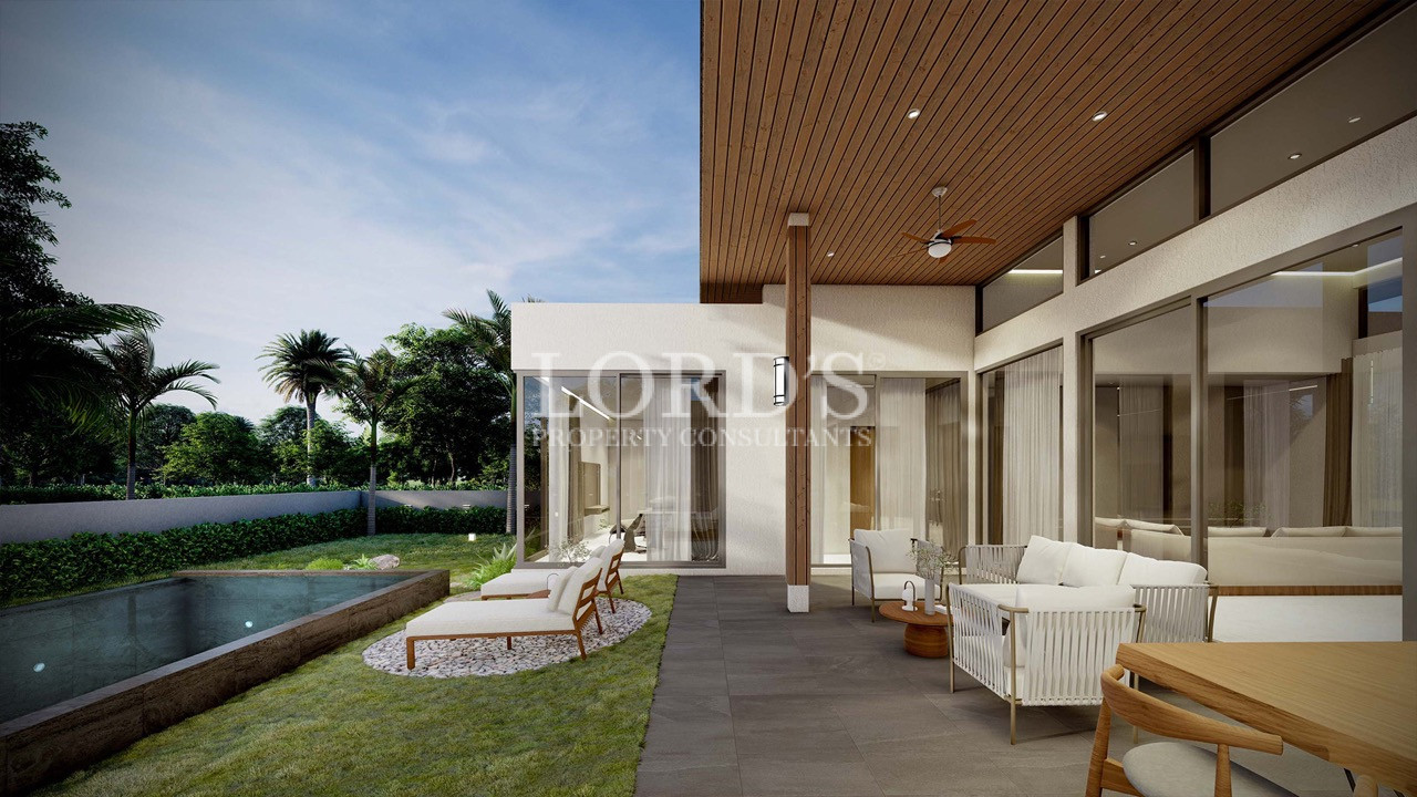 Covered outdoor lounge with garden and pool view