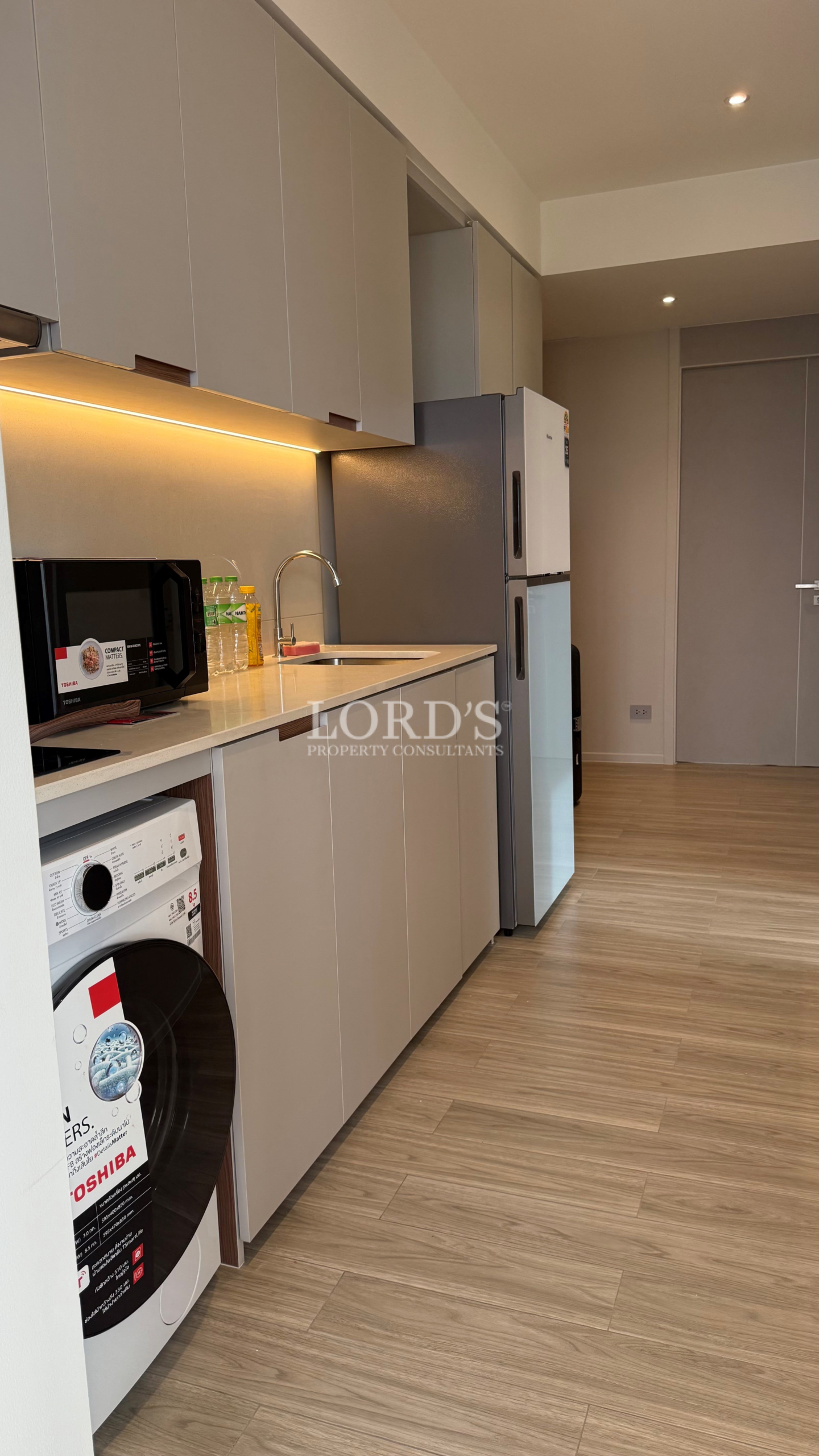 Compact kitchenette with modern appliances