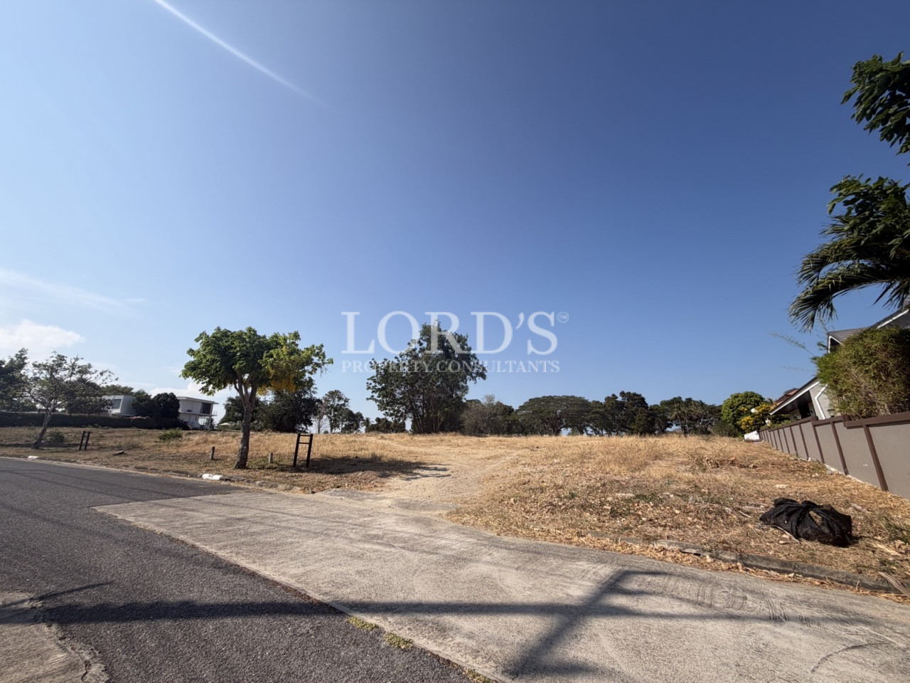 Empty land with wide dirt area