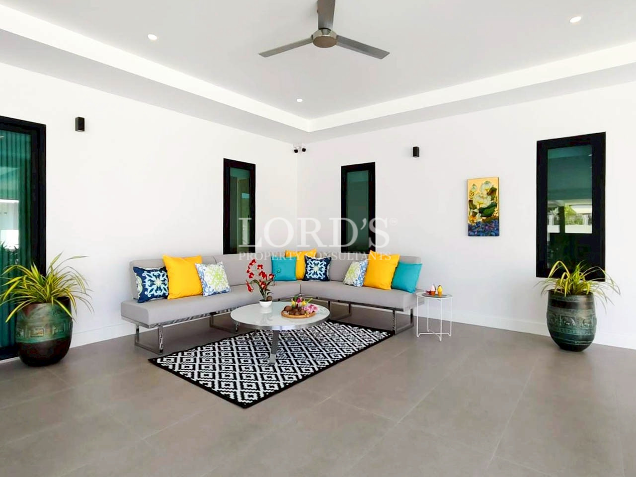 Spacious living room with sectional sofa and modern décor