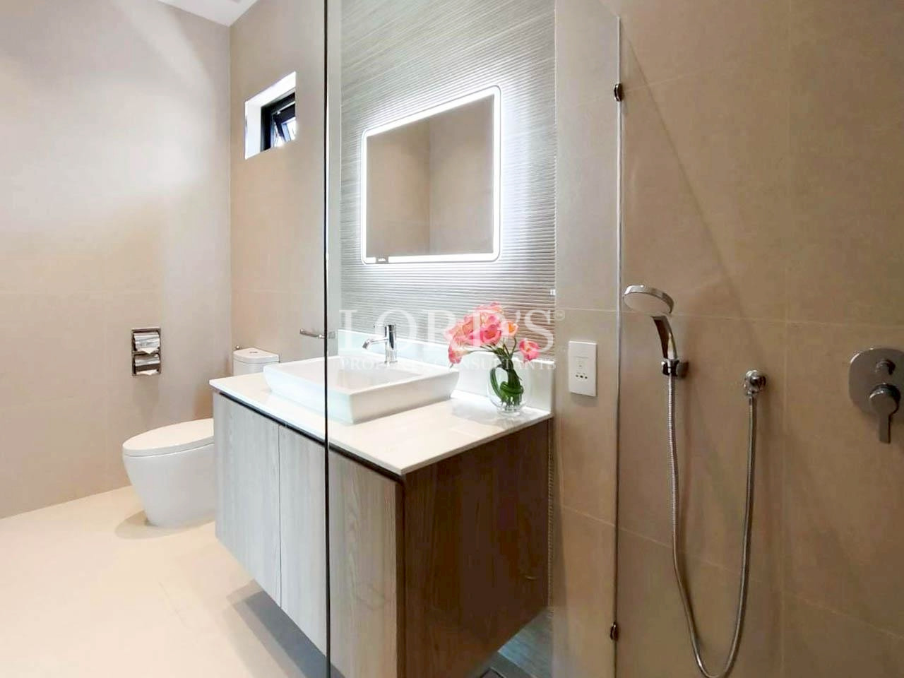 Stylish bathroom with vanity and walk-in shower