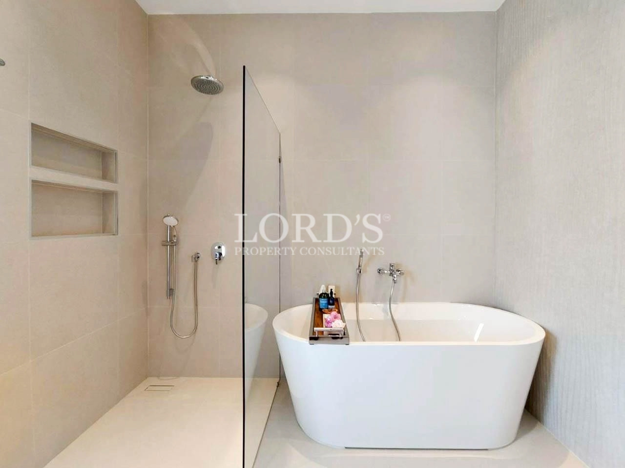 Minimalist bathroom with freestanding bathtub and shower