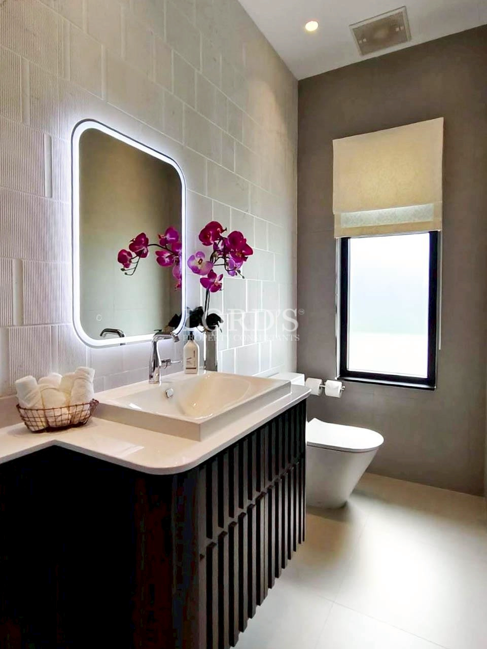 Bathroom vanity with modern sink and mirror