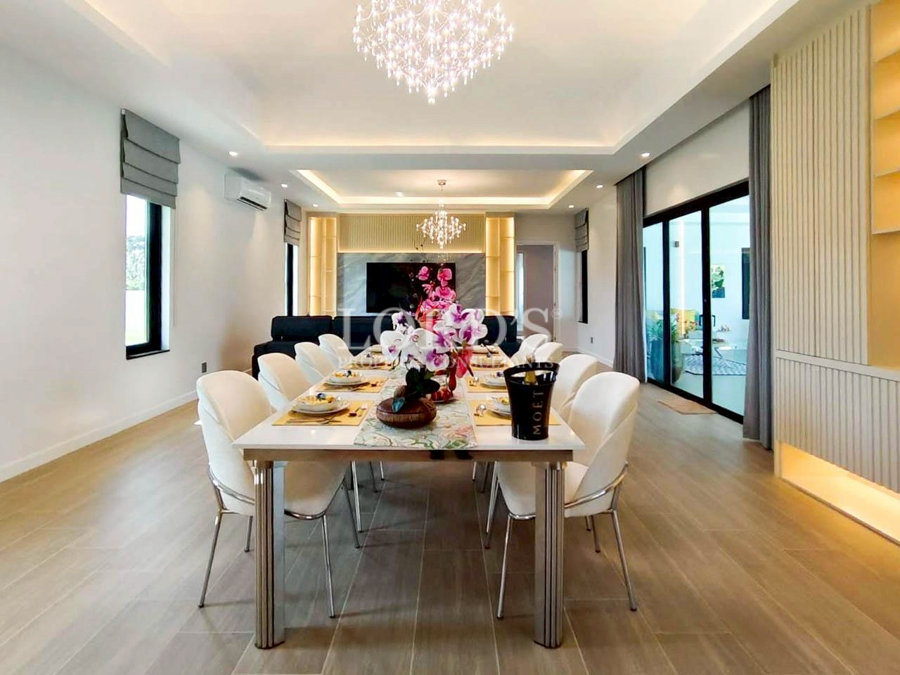 Luxury dining room with chandelier and long dining table