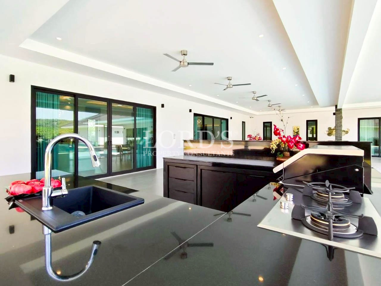 Modern kitchen with black countertop island
