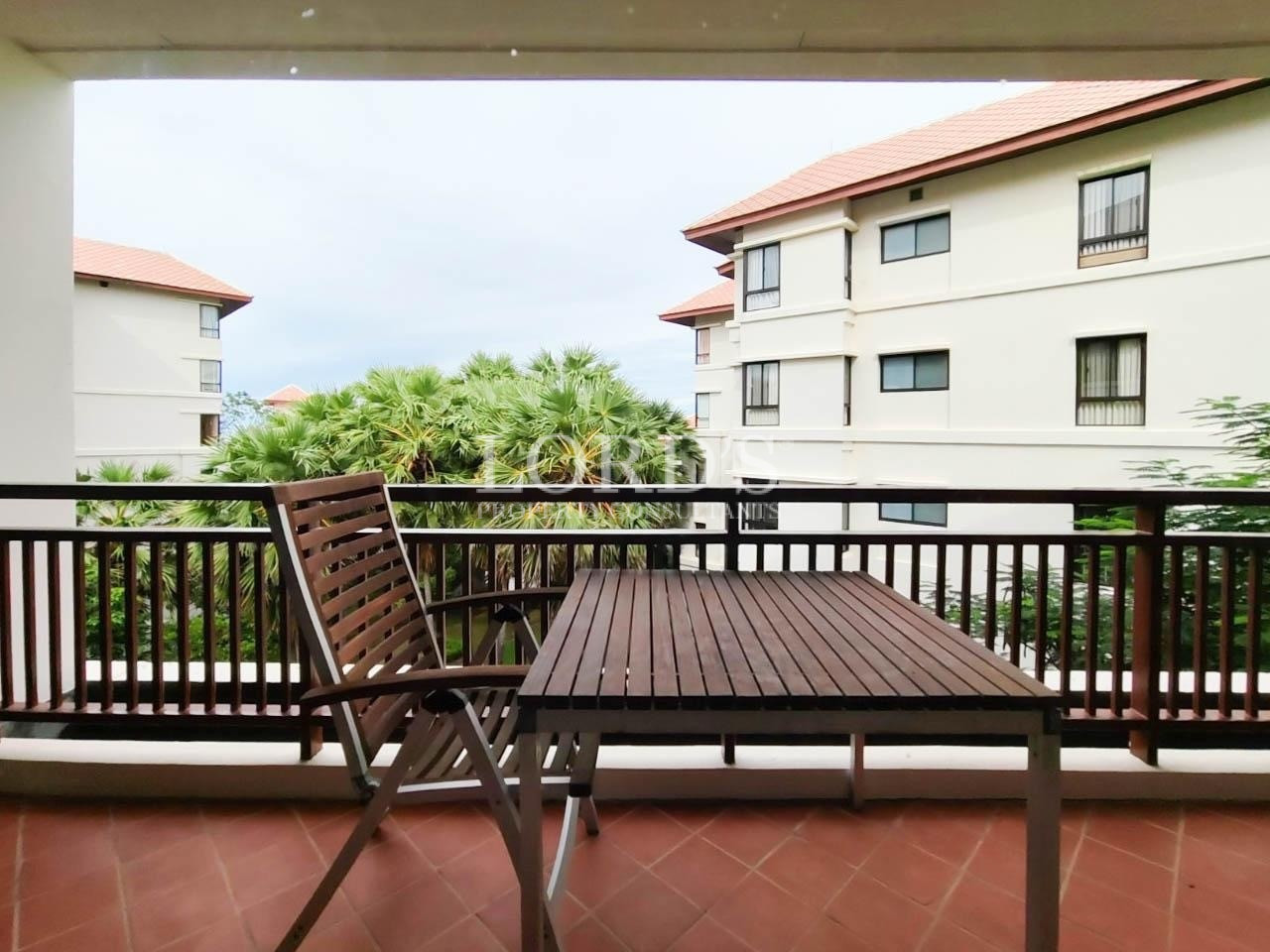 Balcony dining area with mountain view