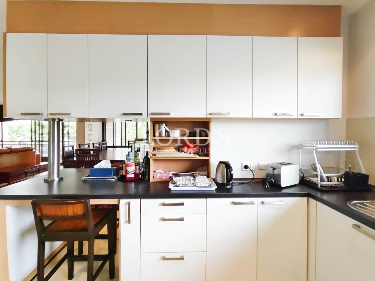 White kitchen with wooden accents