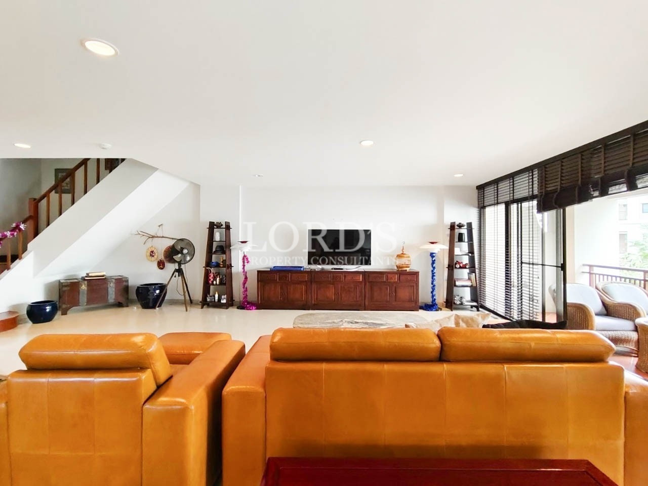 Open living room with leather sofas
