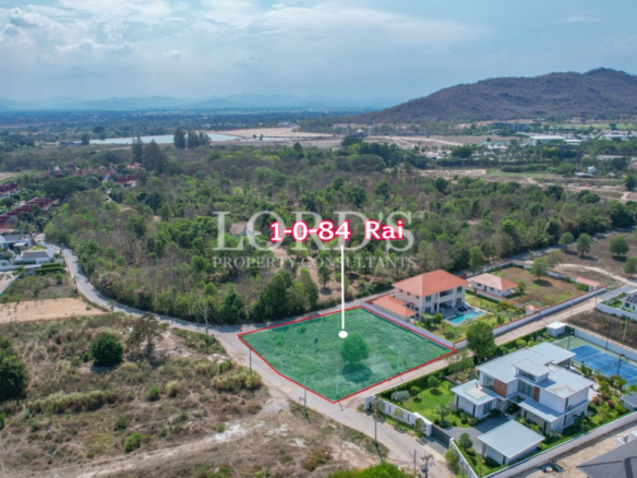 Aerial view of tropical land plots and greenery