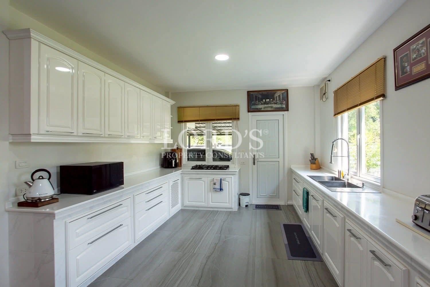 White kitchen with modern cabinetry