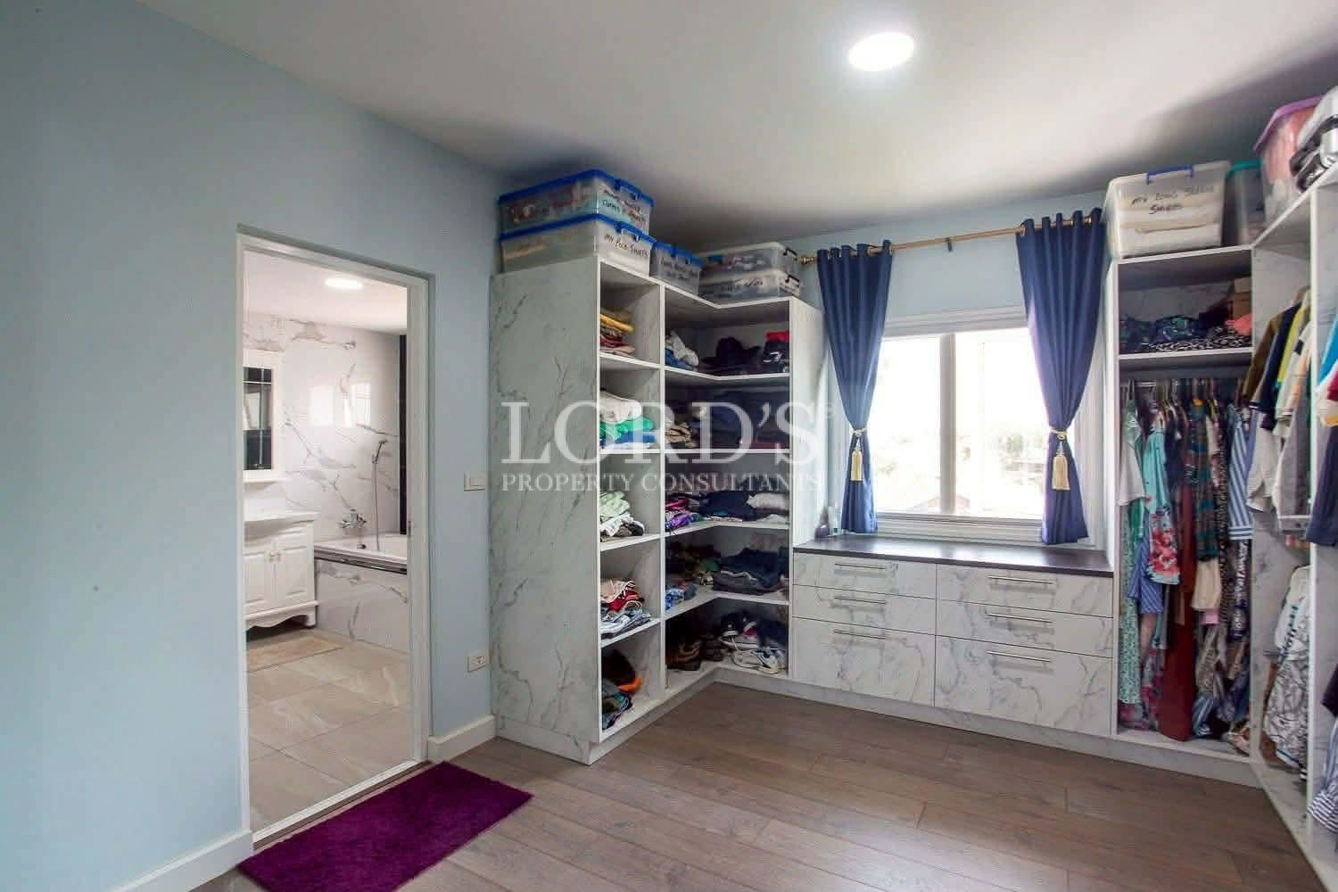 Walk-in closet with shelving units