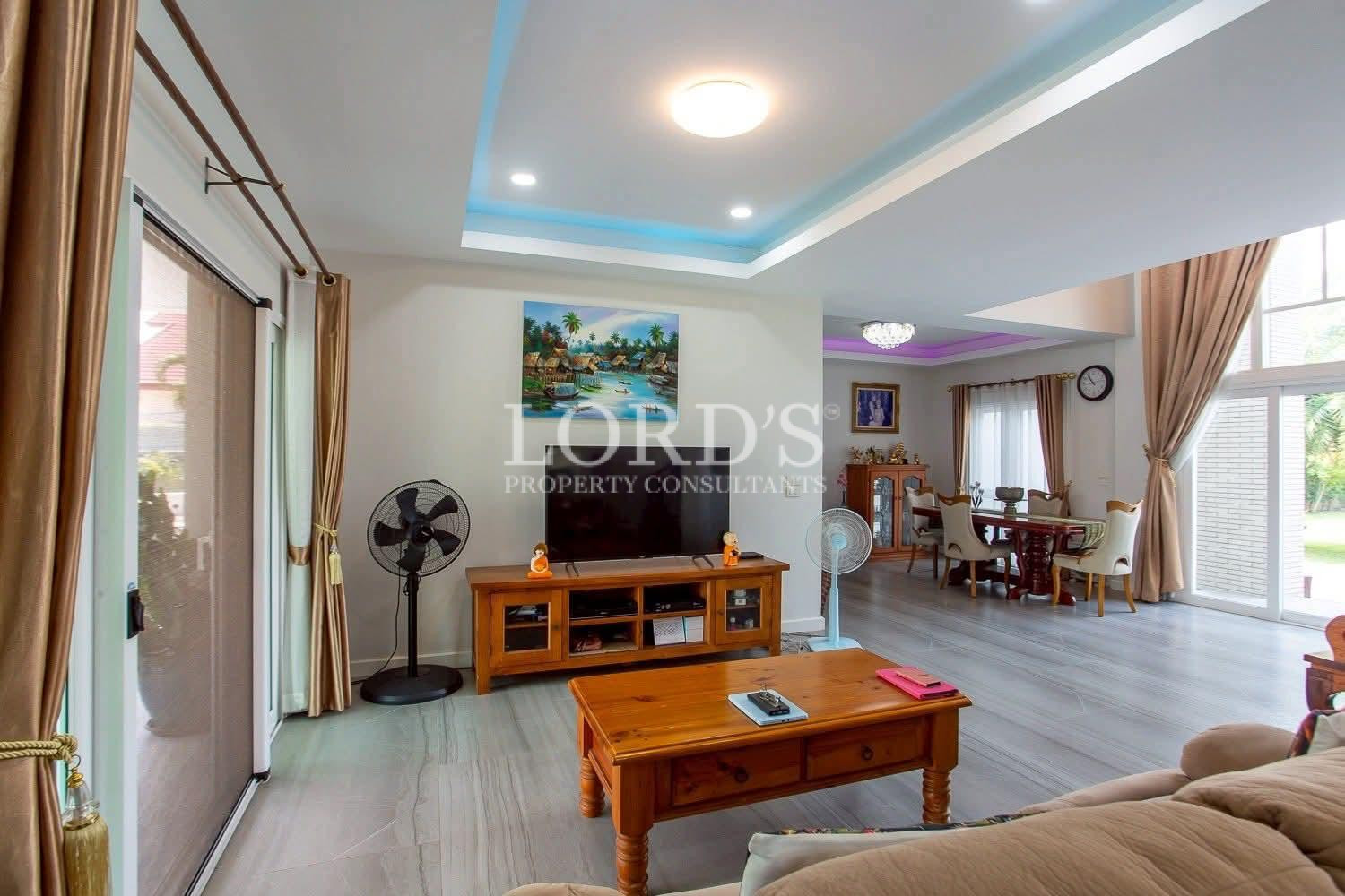 Living room with blue ceiling lighting