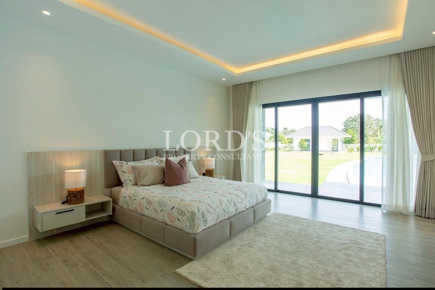 Bedroom with large sliding glass doors